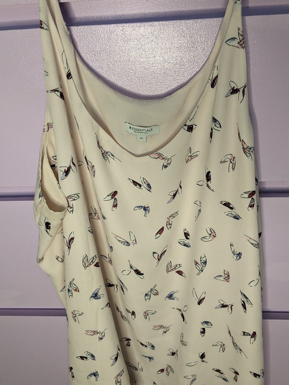 Essentials Women's Cream Tank Top with Feather Print